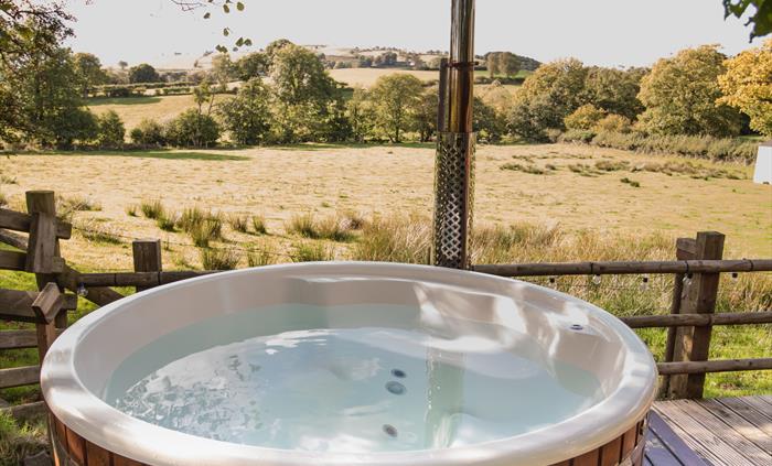 Hot tub with a perfect view over fields and countryside. Watch the sun set over the hills.